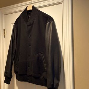 Mens size large jacket. Italian wool with leather sleeves